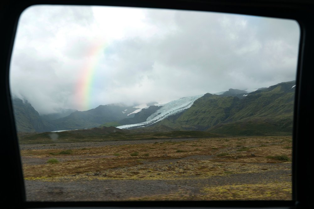 View through a car window showing landscape