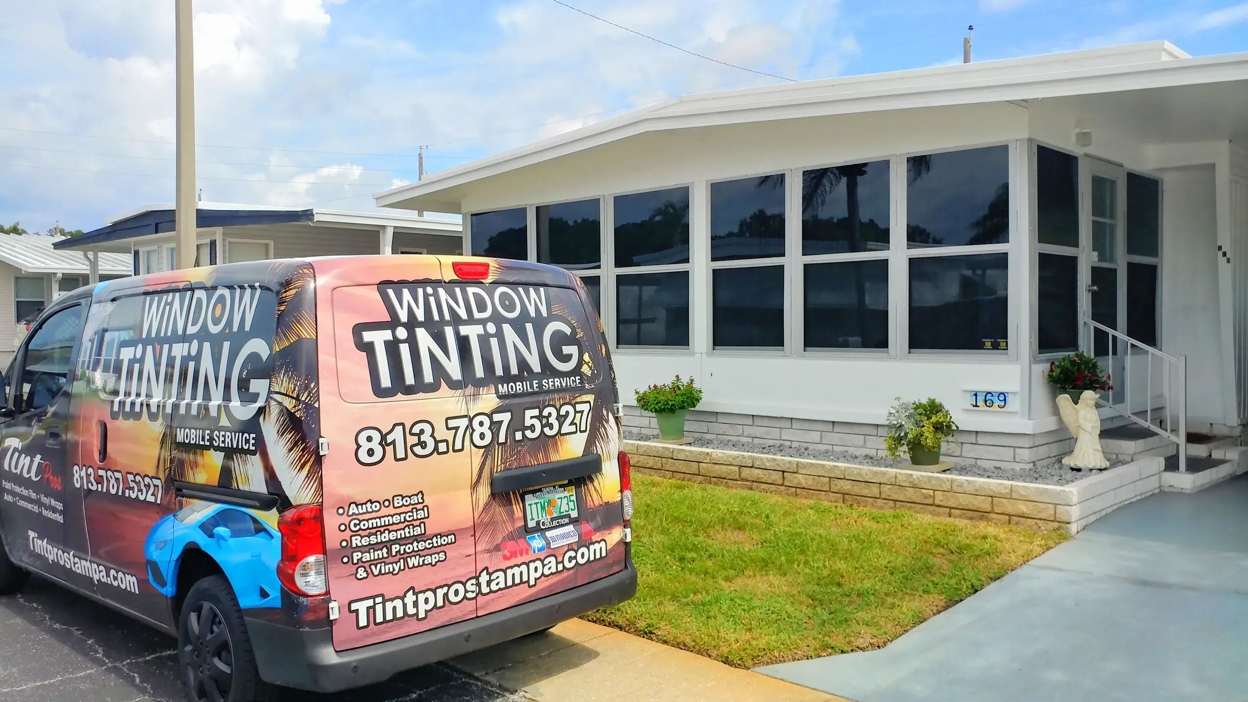 Tint Pro's Tampa service van at a completed residential job